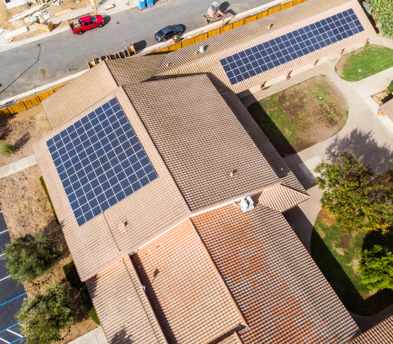 Aerial view of Advent Lutheran Church campus with installed solar arrays