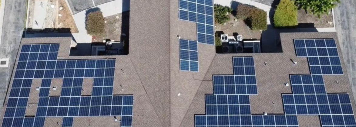 Aerial rooftop solar installation at Clinica Sierra Vista Medical in Lebec, CA